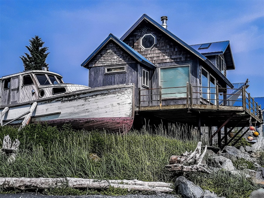 Walking along Resurrection Bay in Seward Alaska when we came across this rustic home. It was kinda breath taking. #Adventure