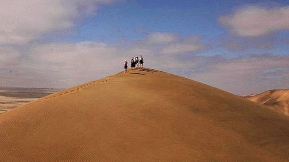 Namibia is a land of contrasts from the Namib Desert to amazing rock formations to Etosha National Park. Climbing the dunes was one of my most memorable travel experiences. Wide open space and sand as far as you can see.
For more see: "11 Incredible Landscape Photos that will Make You Want to Visit Namibia" at http://www.travelblissnow.com/photos-namibia/