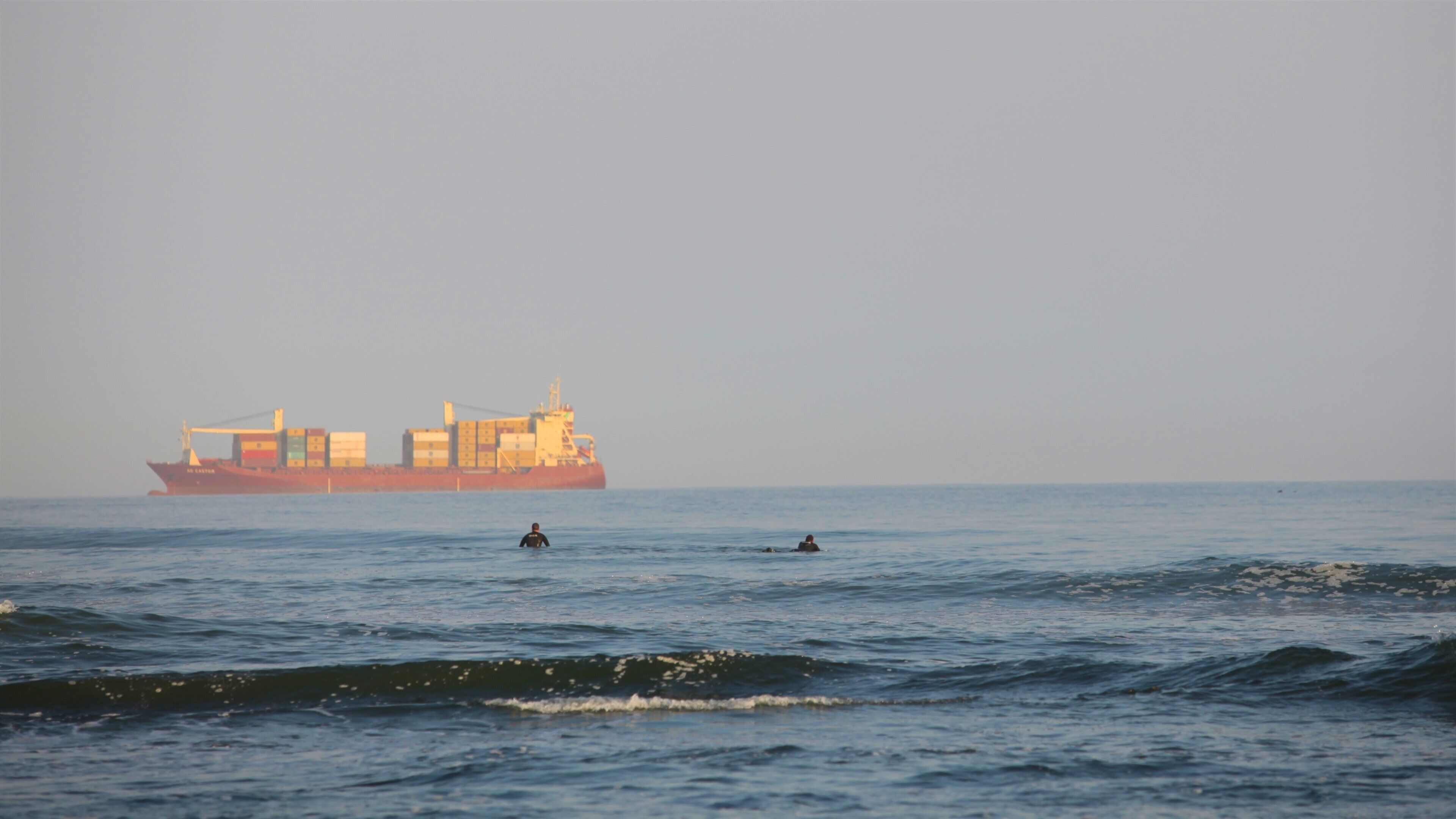 Swakopmund montrant vues littorales, coucher de soleil et vagues