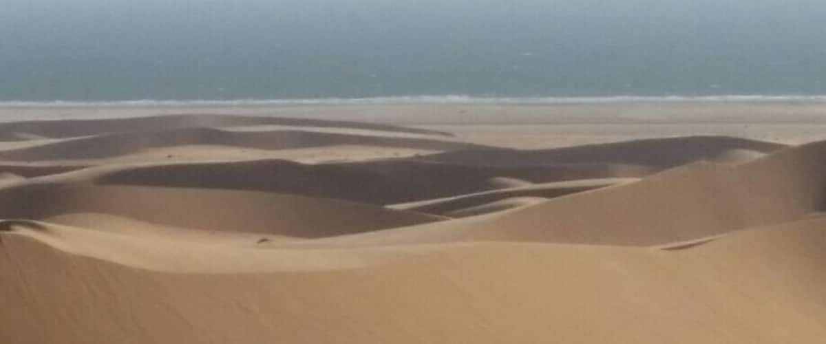 Sand dunes to the ocean.  If in Swakopmund,  you have to go out on the quad bikes!