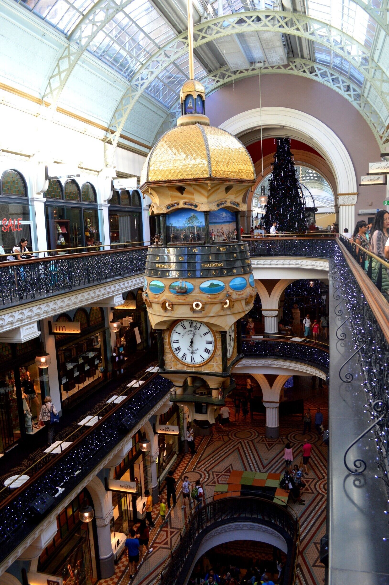 Christmas time in the QVB - the backdrop is the Swarovski Crystal Christmas Tree Stunning and a must see if your in town.
