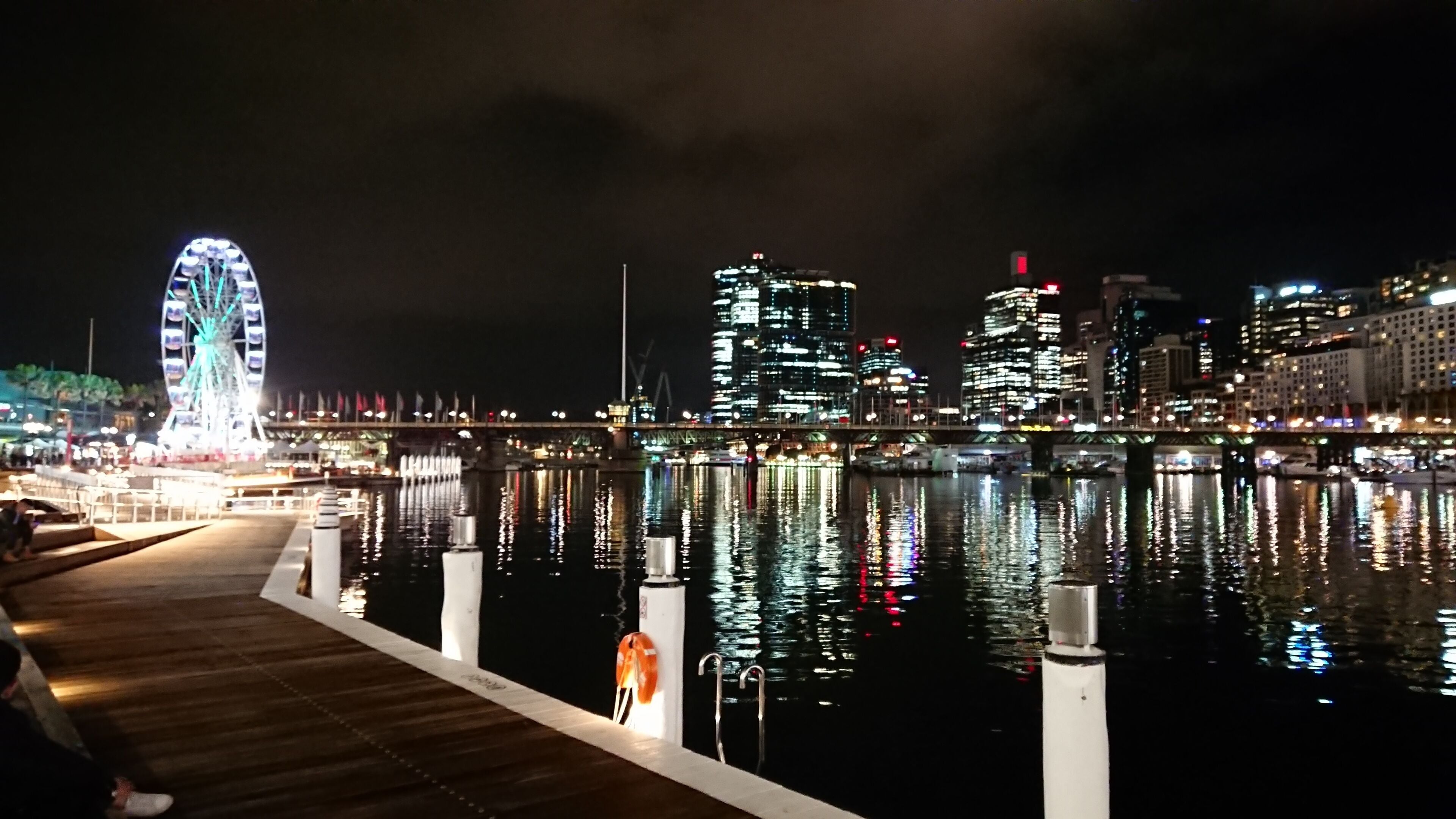 After a cold and wet evening . Darling Harbour looking great on a Friday night