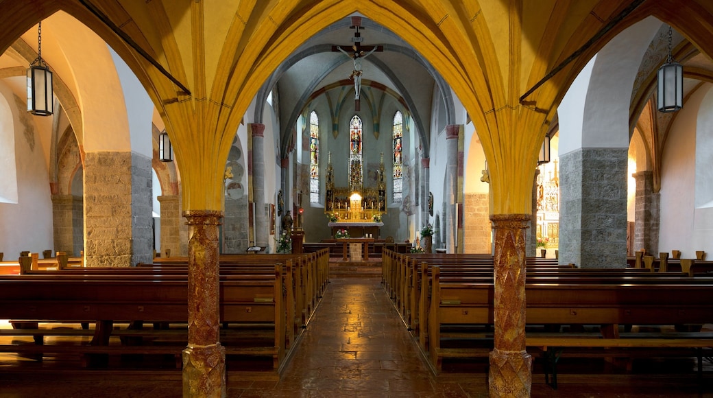 Krimml which includes interior views, a church or cathedral and heritage elements