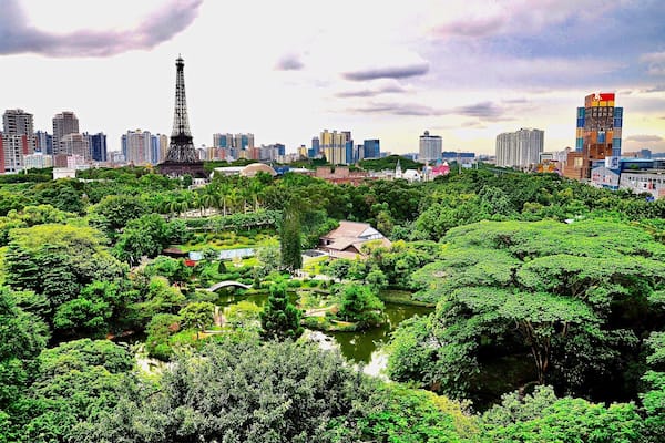 Looking west to the Window of the World (世界之窗) from my friend’s apartment in Shenzhen, Guangdong Province, China. It’s China Mainland’s second theme park after reform and opening up in 1979, and has about 130 reproductions of some of the most famous tourist attractions in the world squeezed into 48 hectares (118 acres). The 108 metre (354 ft) tall Eiffel Tower dominates the skyline and the sight of the Pyramids and the Taj Mahal all in proximity to each other are all part of the appeal of this theme park.
#China #Shenzhen #Guangdong #ThemePark #AboveItAll #WorldOfTheWorld