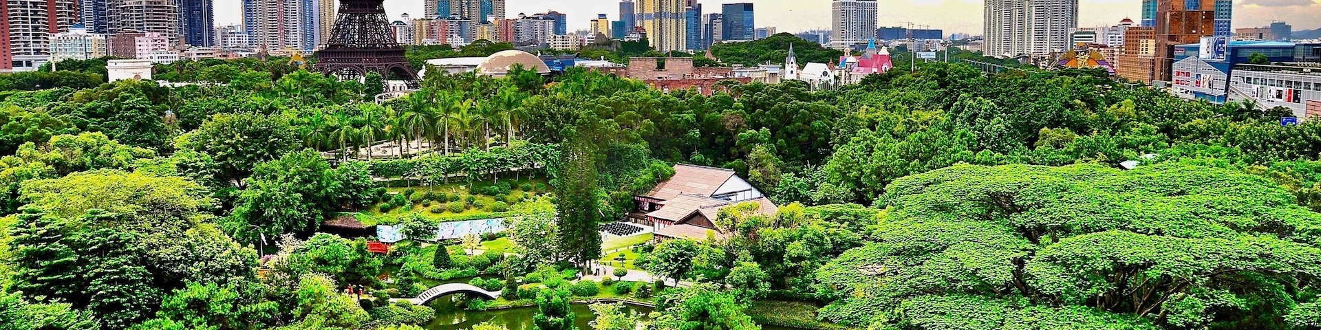 Looking west to the Window of the World (世界之窗) from my friend’s apartment in Shenzhen, Guangdong Province, China. It’s China Mainland’s second theme park after reform and opening up in 1979, and has about 130 reproductions of some of the most famous tourist attractions in the world squeezed into 48 hectares (118 acres). The 108 metre (354 ft) tall Eiffel Tower dominates the skyline and the sight of the Pyramids and the Taj Mahal all in proximity to each other are all part of the appeal of this theme park.
#China #Shenzhen #Guangdong #ThemePark #AboveItAll #WorldOfTheWorld