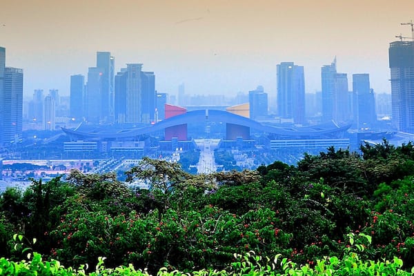 Looking down to Shenzhen Civic Center from the lookout of Mount Lotus (蓮花山) in Shenzhen, Guangdong, China. Shenzhen is the fourth largest city in China and the eighth-most-populous city proper in the world by population (12,528,300). The city is also on the list of UNESCO Creative Cities.