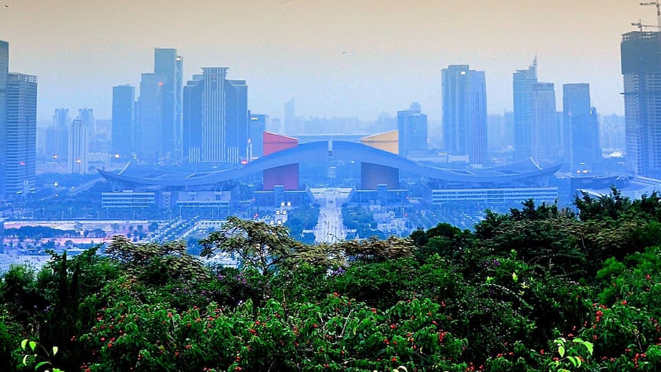 Looking down to Shenzhen Civic Center from the lookout of Mount Lotus (蓮花山) in Shenzhen, Guangdong, China. Shenzhen is the fourth largest city in China and the eighth-most-populous city proper in the world by population (12,528,300). The city is also on the list of UNESCO Creative Cities.