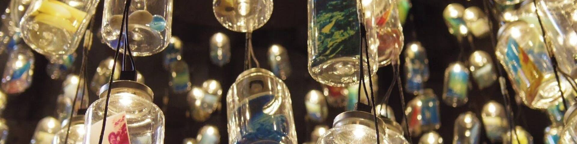 This was my favorite art installation on Ogijima, an island in the Seto Inland Sea. It was part of the art festival held every three years, Setouchi Triennale in 2013.
The gallery Memory Bottle was installed by Mayumi Kuri. Almost 1,000 bottles are on display, all with pictures or small trinkets inside. In her interview she says that she wanted to gather memories of the local people in Ogijima so she set up a collection box, asking people to put their memories in it. The bottles were lit up with lights and had everything from pictures to train tickets.
The gallery is still open even though the next Setouchi Triennale is not until 2016. If you want to see the art during the islands off season, now is the time to go :)
* 40min ferry ride from Takamatsu Port. It is about a 1.5hr flight from Tokyo to Takamatsu.
Blog post: http://goo.gl/X0DvLJ
More ino: http://goo.gl/gMeS6H