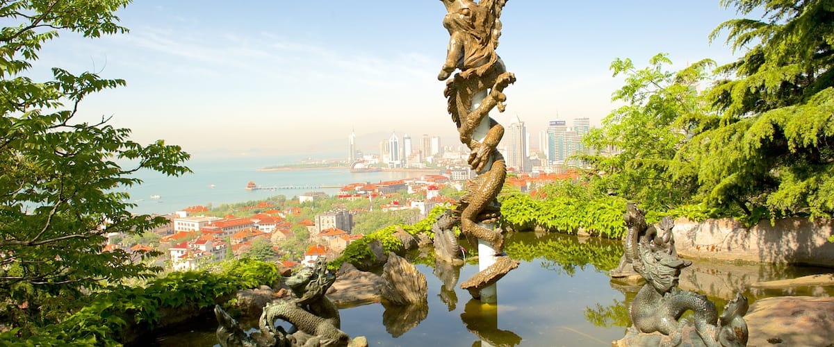 Qingdao featuring a coastal town and a pond