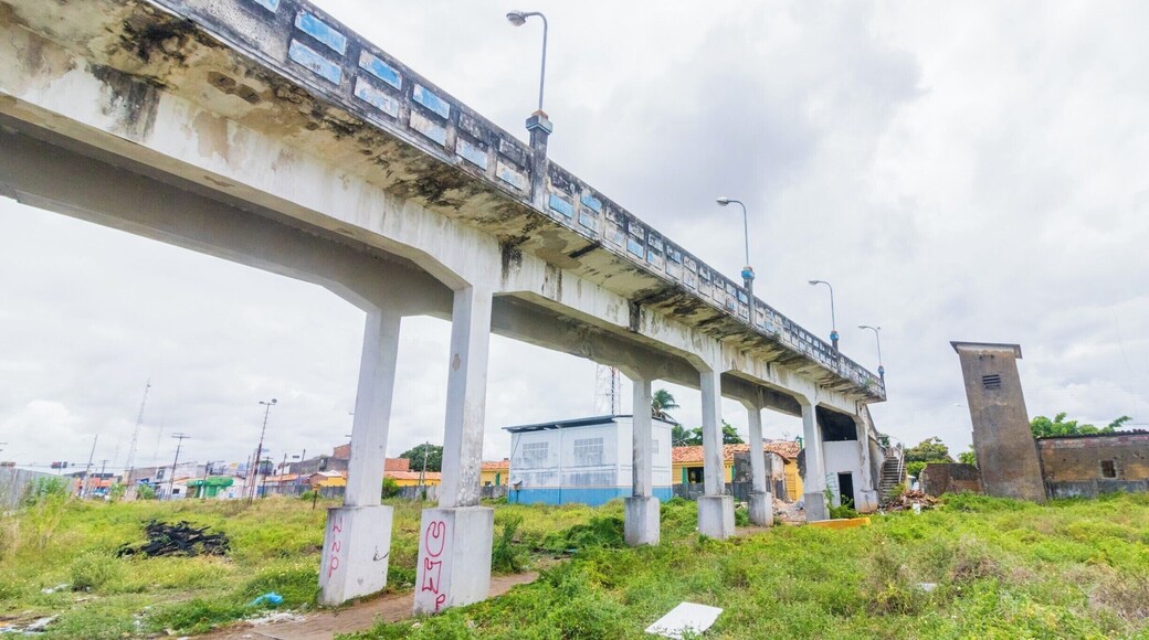 Pedestrian overpass at Estação Ferroviária de Aracaju, an abandoned railroad station. The pedestrian overpass is fully functional, connects two neighborhoods in Aracaju, and is a great place to photograph the railroad yard and station.