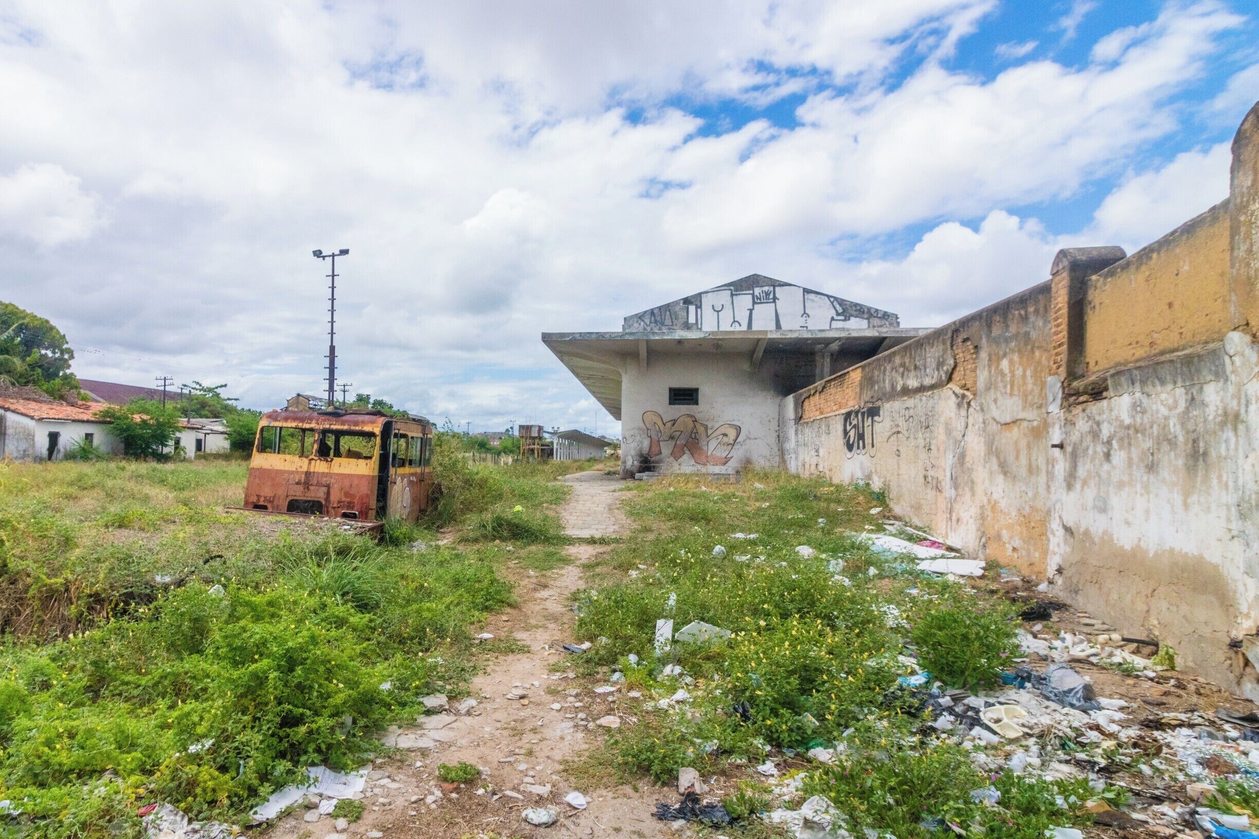 View of Estação Ferroviária de Aracaju from the base of the concrete pedestrian overpass. Aracaju, Sergipe, Brazil.