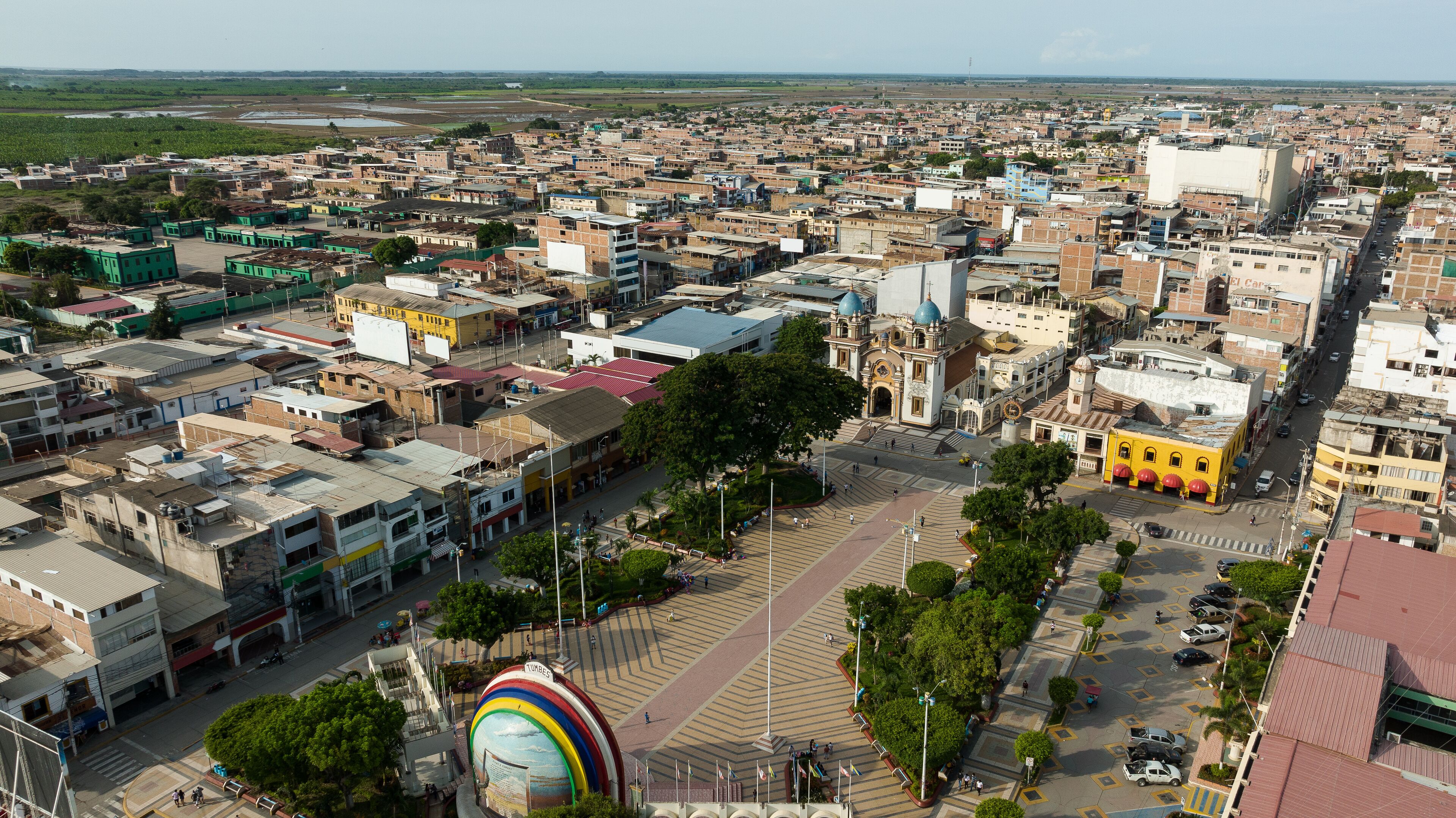 Aerial shot of the main park, church and city of Tumbes, Peru