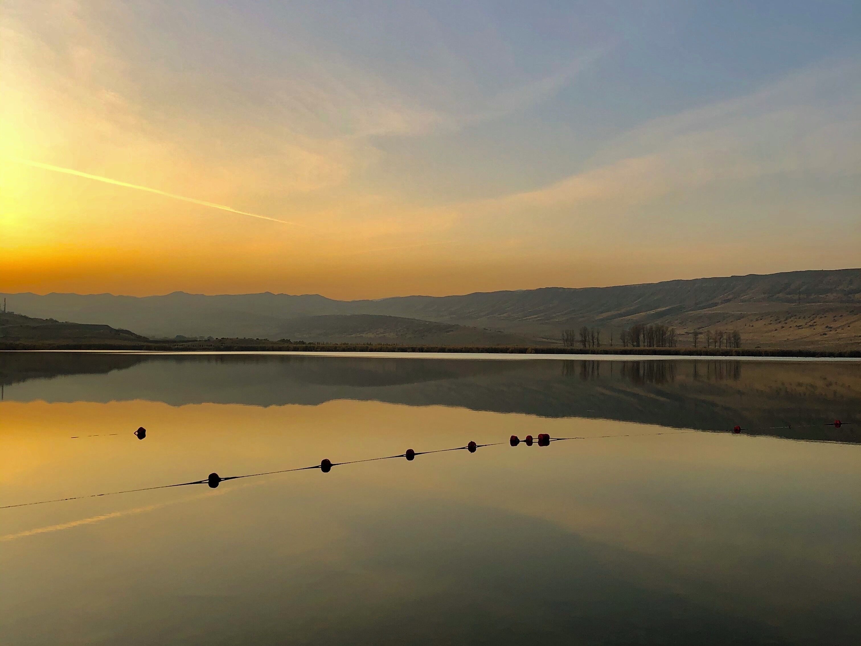 View of the surface of Lisi Lake in the city of Tbilisi, Georgia. Lisi Lake, a small lake, surrounded by a bike and hiking trail, is a popular relaxation spot in the city.