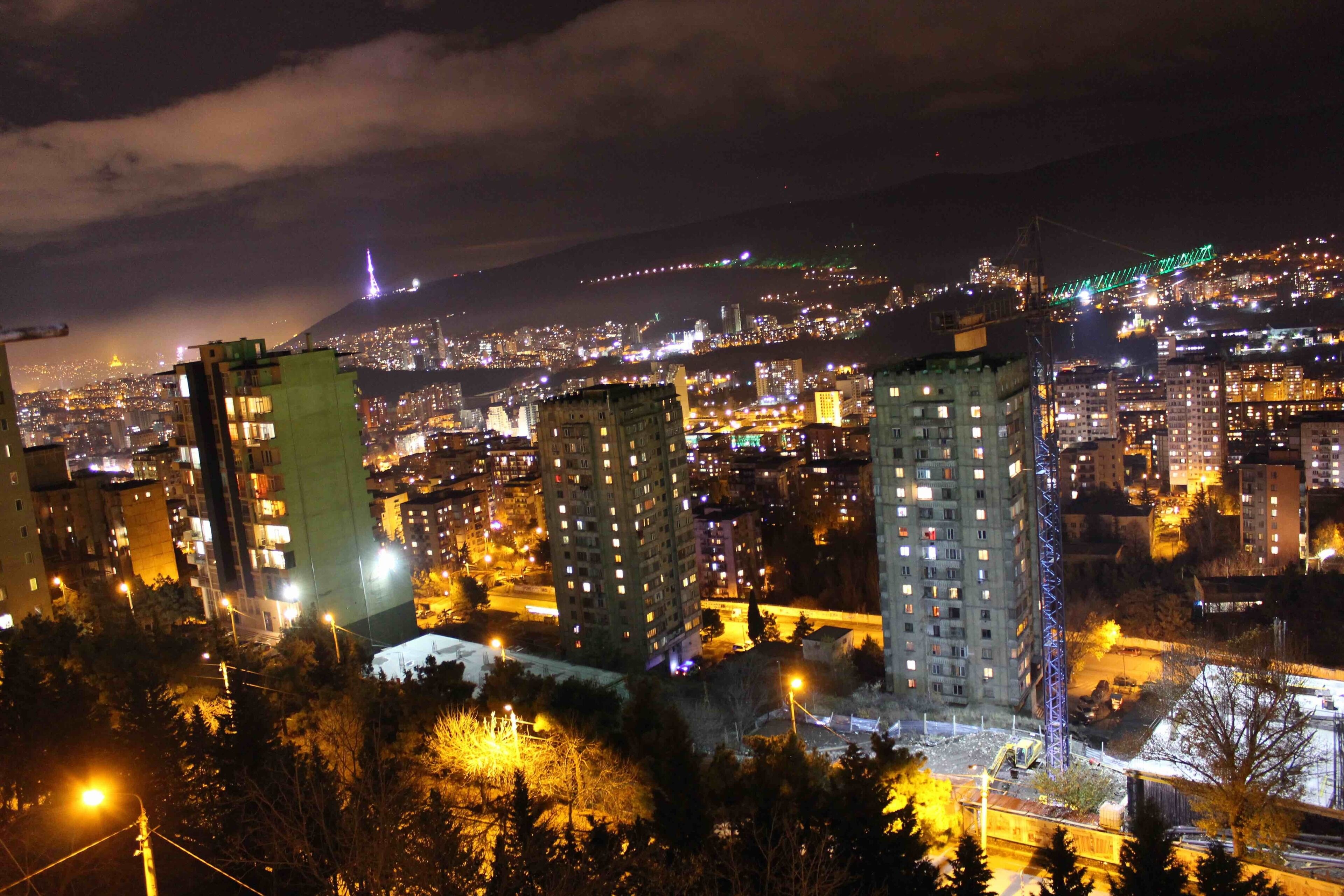 Looking out over the Georgian capital of Tbilisi at night.