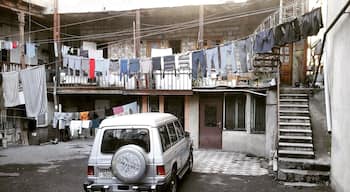 Courtyard of an apartment building in the city of Tbilisi - clothes hanging on the line.