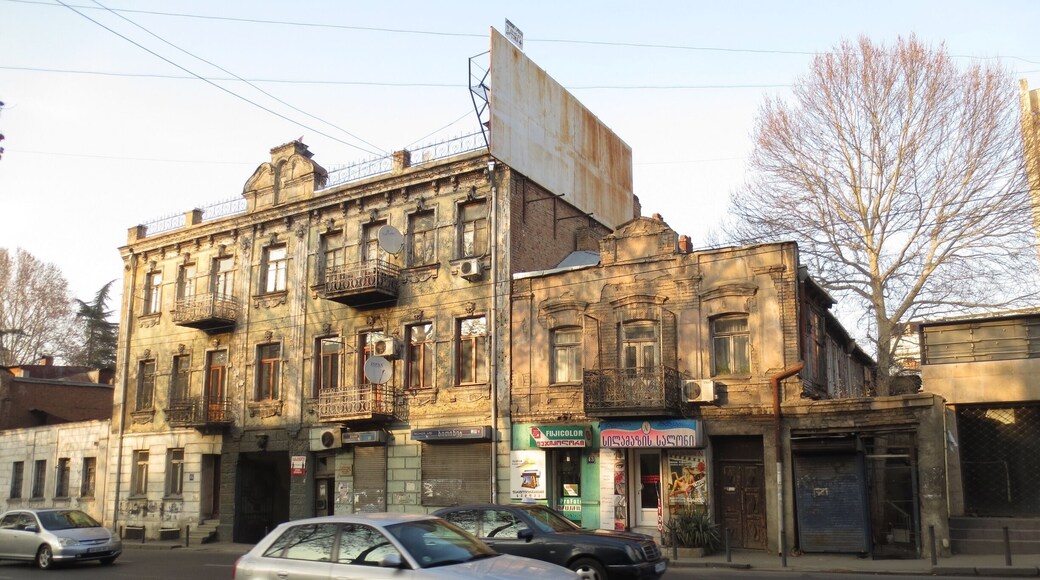 #architecture http://tinyurl.com/lnjfapv This building is one of my favorites in the city of Tbilisi, Georgia.
While I don't know much about architecture, I believe that this building is one of the few and dwindling examples of Art Nouveau architecture that remain in Tbilisi.
The top of this building features a date of 1912, and there's a number of frescoes and interesting masonry work on the outside. The building literally looks like it is rusting away.
Link is to an article about Art Nouveau architecture in Tbilisi.