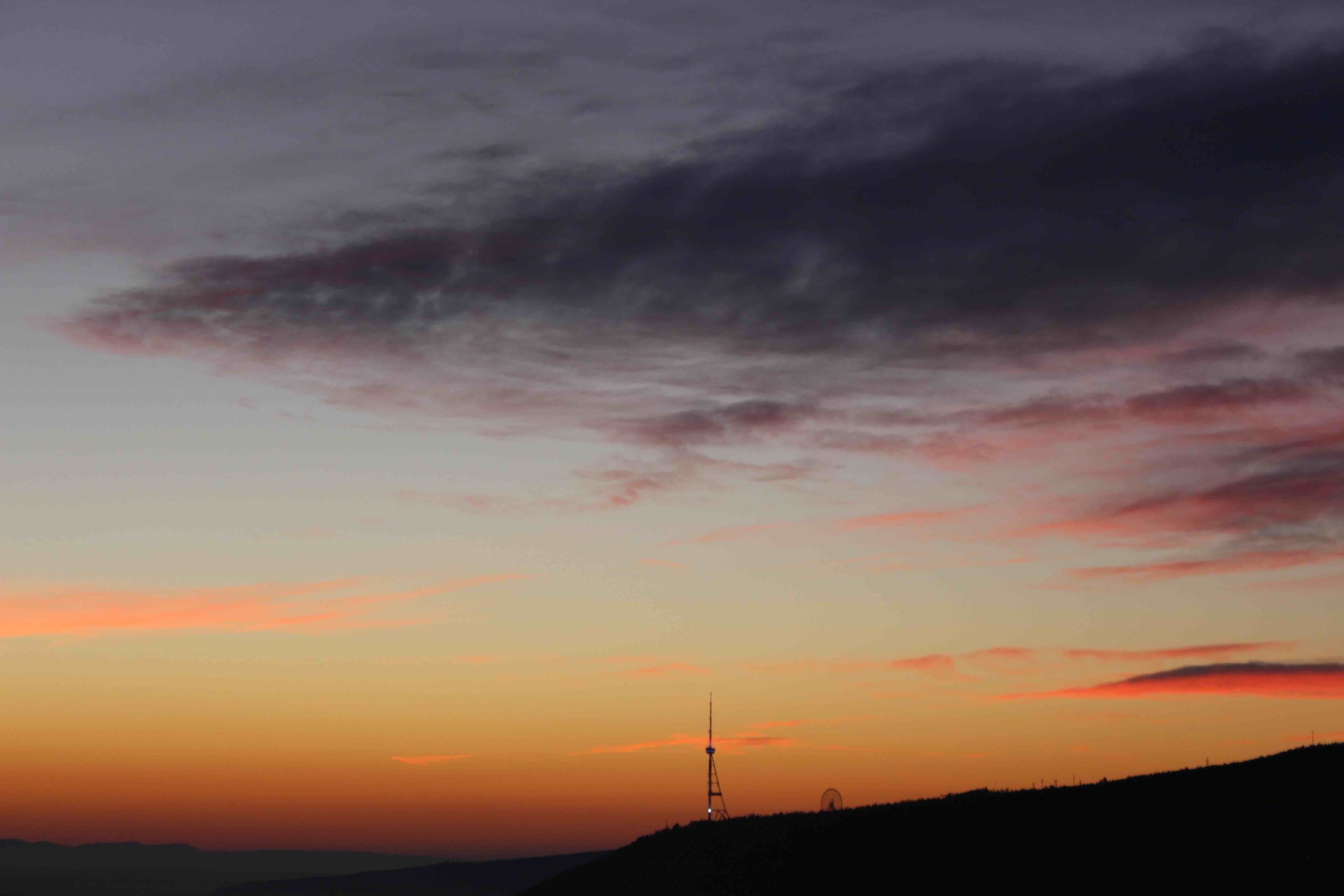December sunrise in the Georgian capital of Tbilisi. Looking out toward a television tower that sits atop Mtatsminda hill.