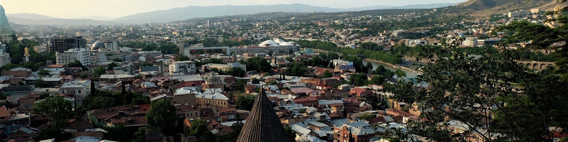 On Narikala Hill there is this cool place where You can sit down, buy cold georgian beer and enjoy the view of the capital city during sunset ;)