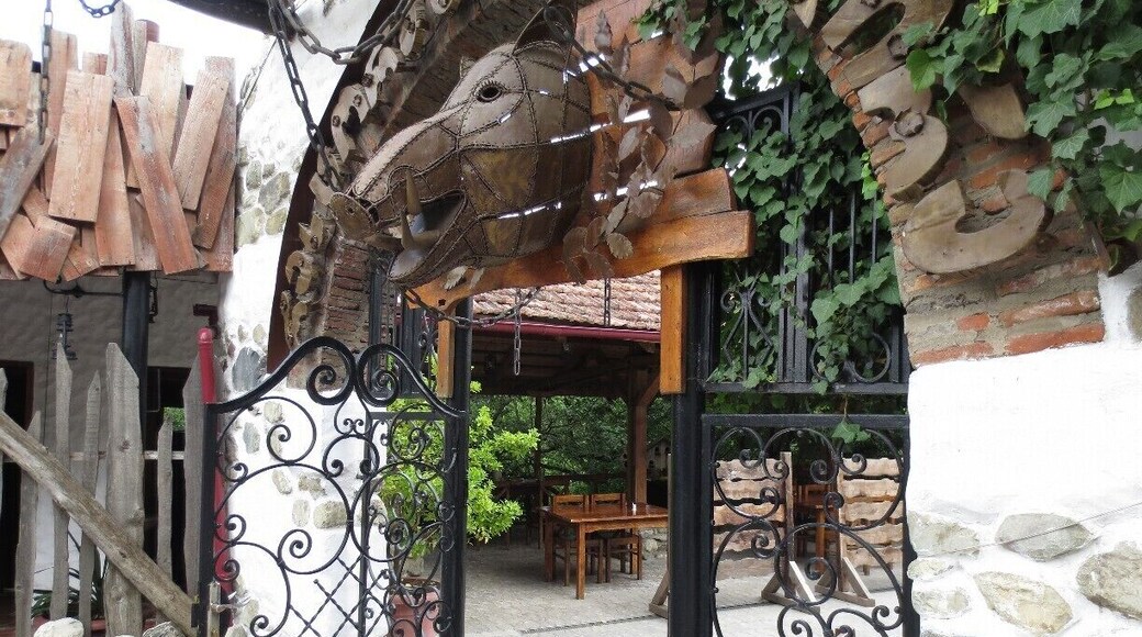 Elaborate metal sculpture at the entrance to a restaurant called "Monadire" in Tskneti, Georgia.