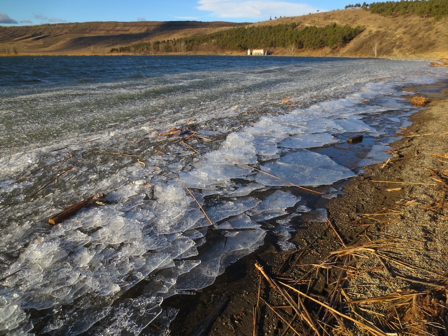 Frozen ice on the shore of Lisi Lake in the city of Tbilisi. 
Lisi Lake is a freshwater lake on a plateau that rises over the city. The entire surface of the lake froze during a recent cold snap. 
A brief climb in temperatures thawed most of the lake - the ice that remained broke into pieces and was carried by strong winds to one part of the shore.