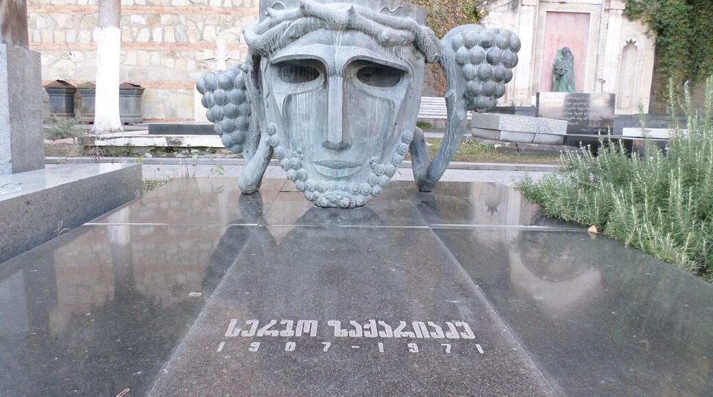 The grave of a Soviet-era actor named Sergo Zakariadze. This picture was taken at a place called the Mtatsminda Pantheon in the city of Tbilisi, Georgia.
The Mtatsminda Pantheon is a graveyard for historical figures in Georgian history - this graveyard is located in the courtyard of a church that has a scenic outlook over the entire city of Tbilisi.