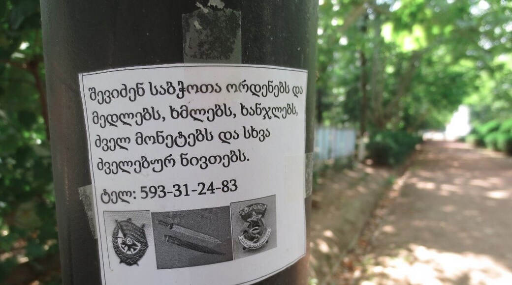 A common sight in the city of Tbilisi - a flier looking for people who are willing to sell Soviet-era knickknacks.