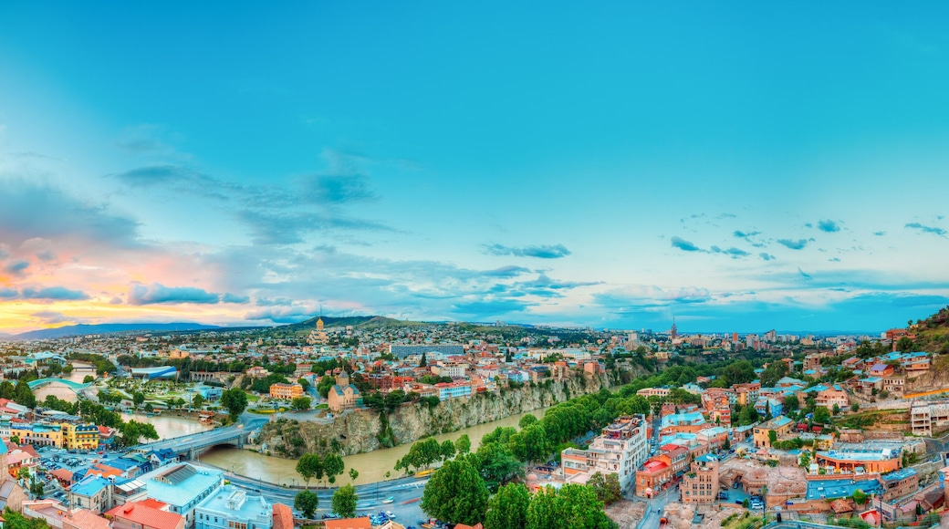 Panoramic Top View Of Tbilisi Georgia. Skyline, Beautiful Sunset