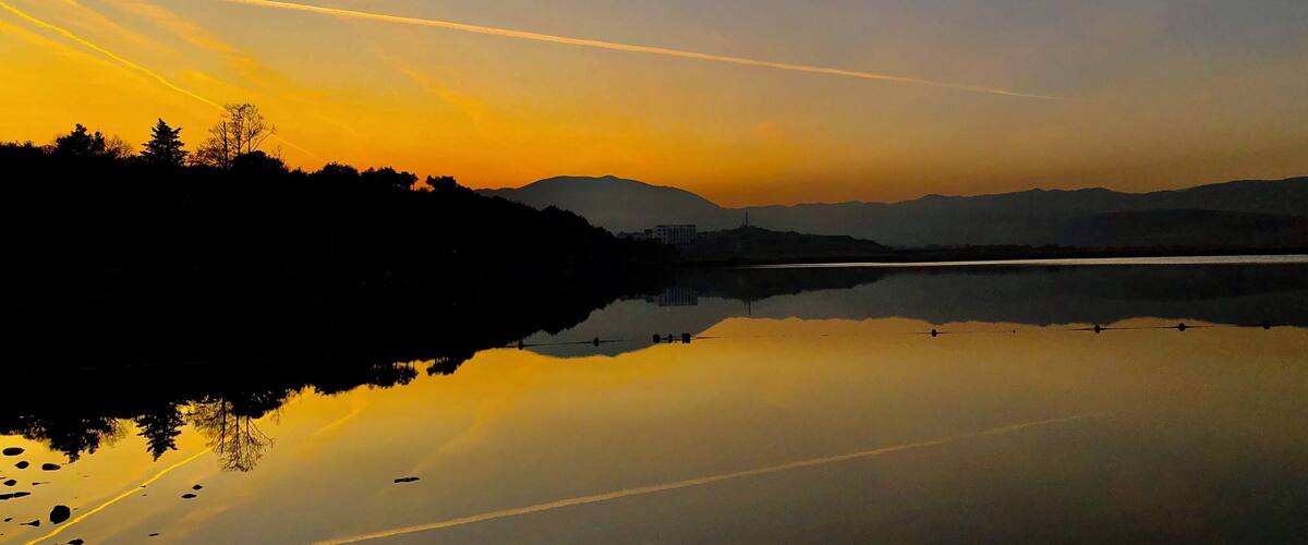 Sunset at Lisi Lake (Georgian: ლისის ტბა) in the city of Tbilisi, Georgia.