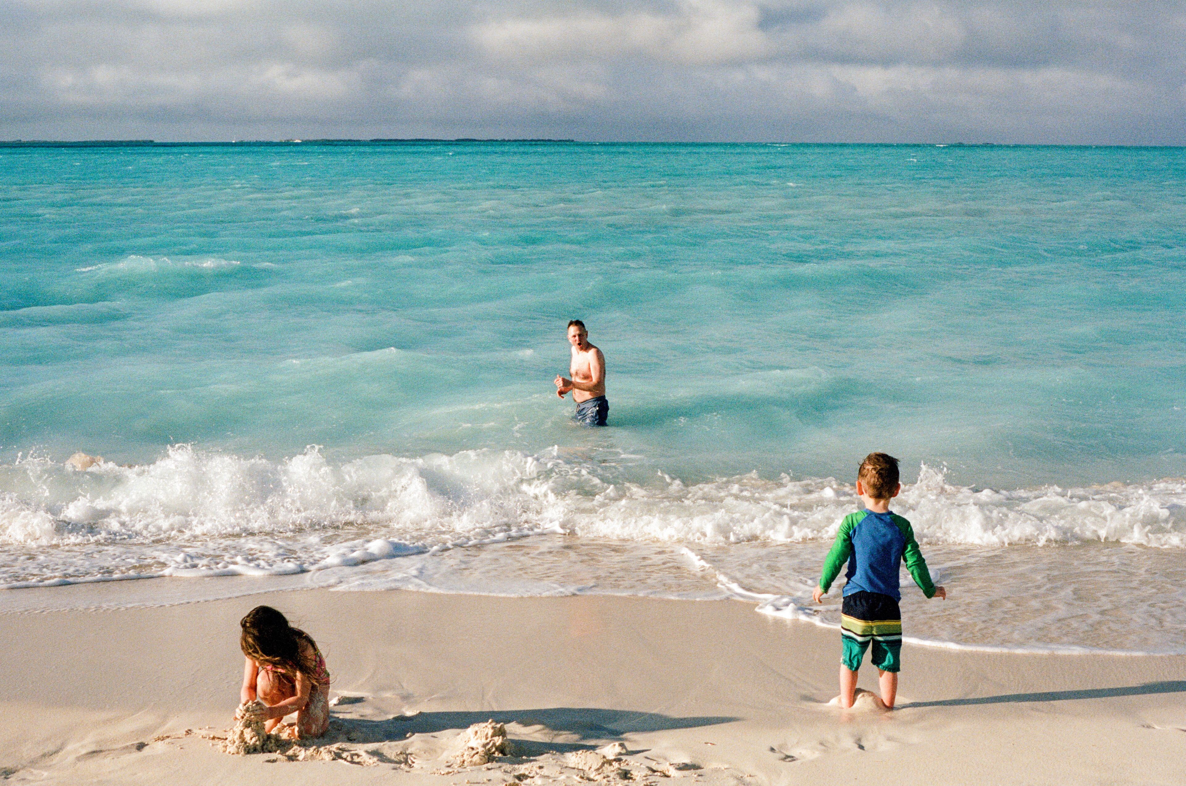 Swimming and Playing on Family Beach Vacation in the Bahamas