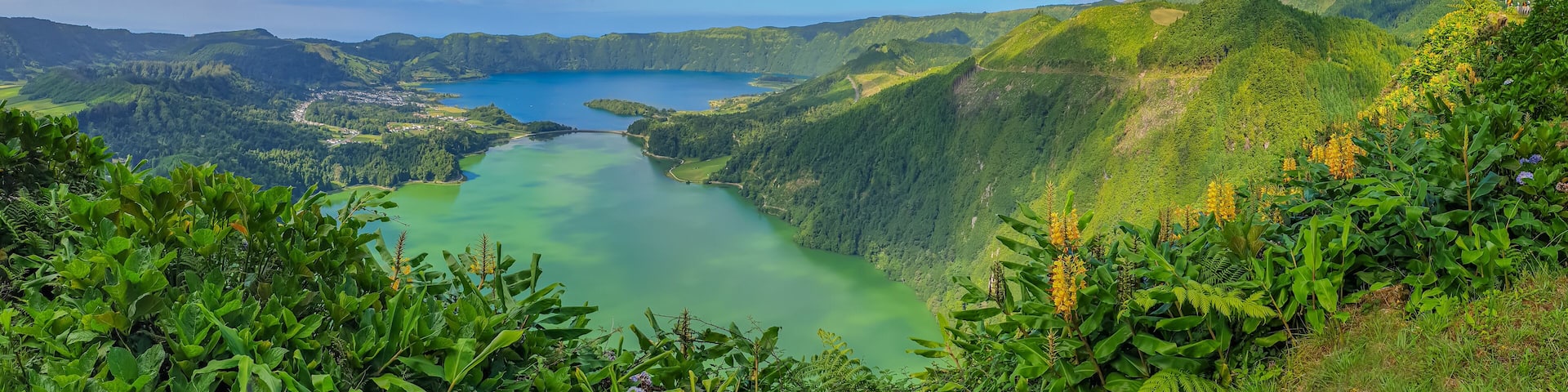 Panorama landscape with clouds and blue sky from the volcanic crater lake of Sete Citades in Sao Miguel Island of Azores Portugal