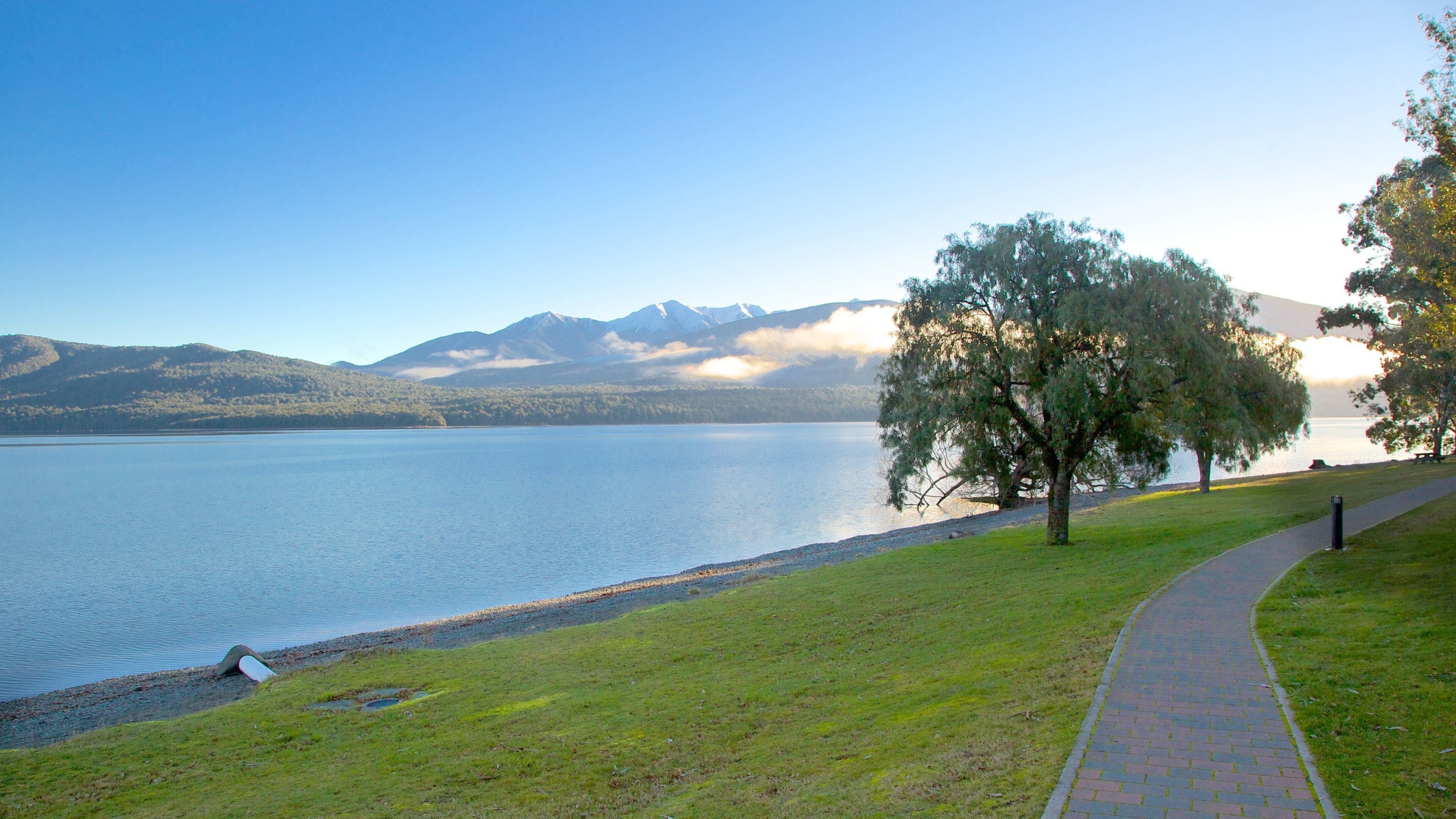 Te Anau featuring a lake or waterhole