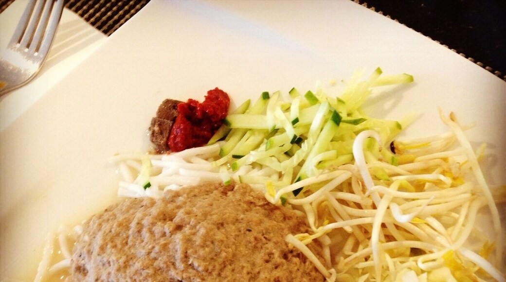 Try this spaghetti like rice noodles called "Laksa". Served with raw vegetables condiments and fish based coconut gravy. Found throughout Terengganu and Kelantan states. To eat mix it all together. Enjoy!