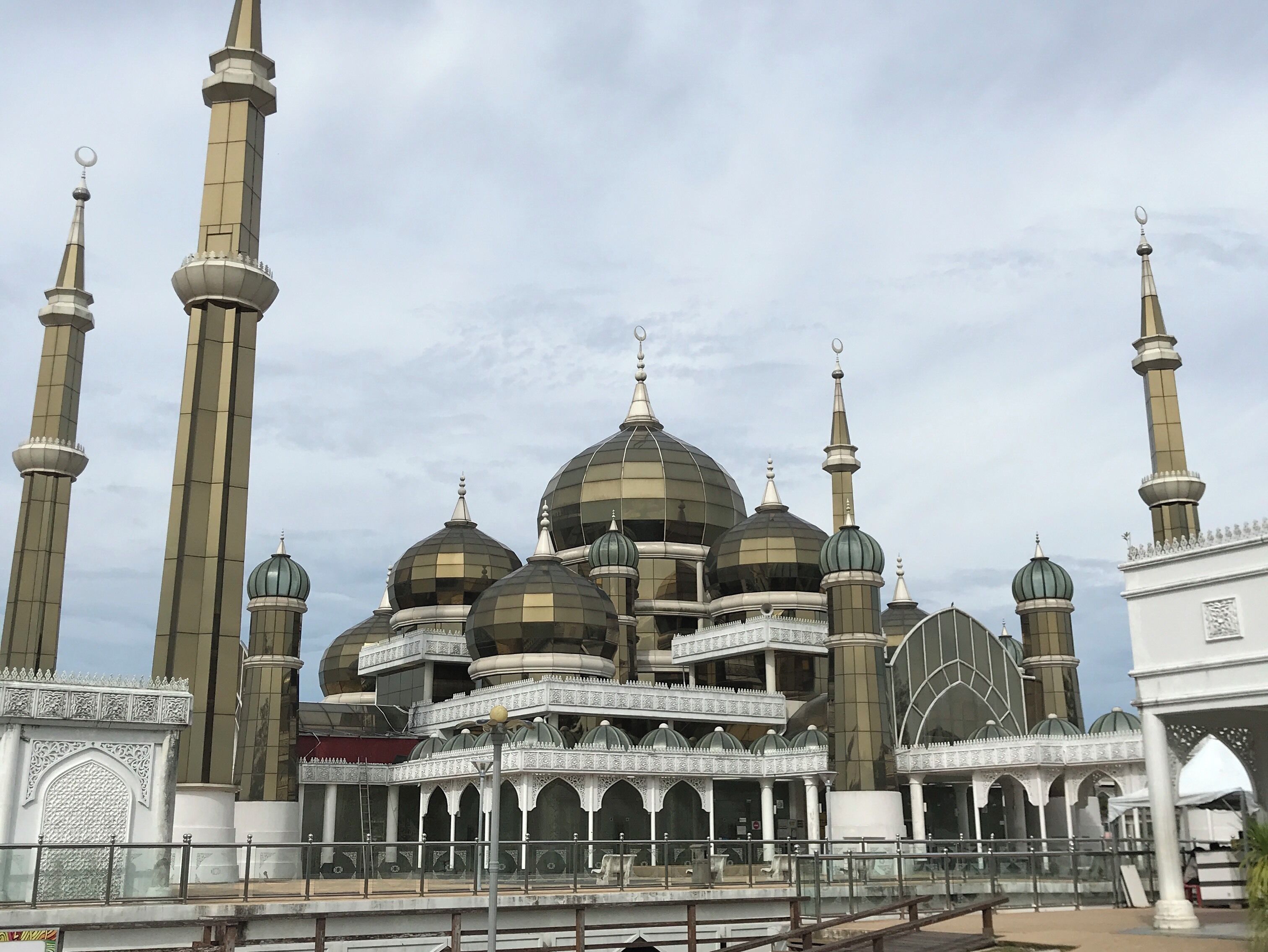 A mosque with multiple domes and tall minarets.