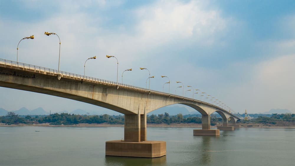 Third Thai–Lao Friendship Bridge, is a bridge over Mekong river that connects Nakhon Phanom Province in Thailand with Thakhek, Khammouane in Laos in cloudy blue sky day