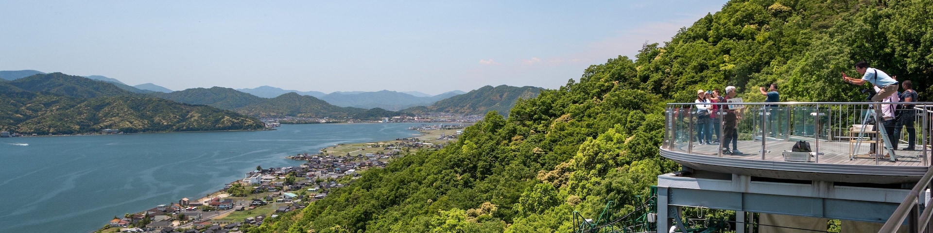 Toyooka featuring a coastal town and views