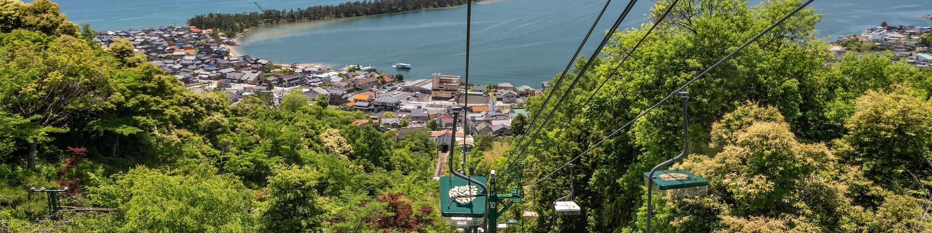 Toyooka which includes a coastal town and a gondola