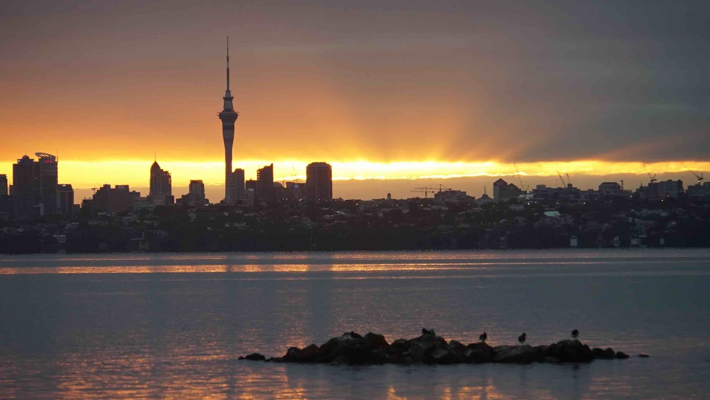 Sunrise over Auckland city - Tamaki Makaurau in Maori language.