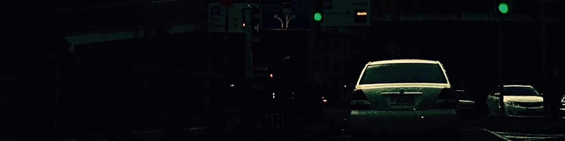 Sunset on the Sky Tower in Auckland creating a moody backdrop.