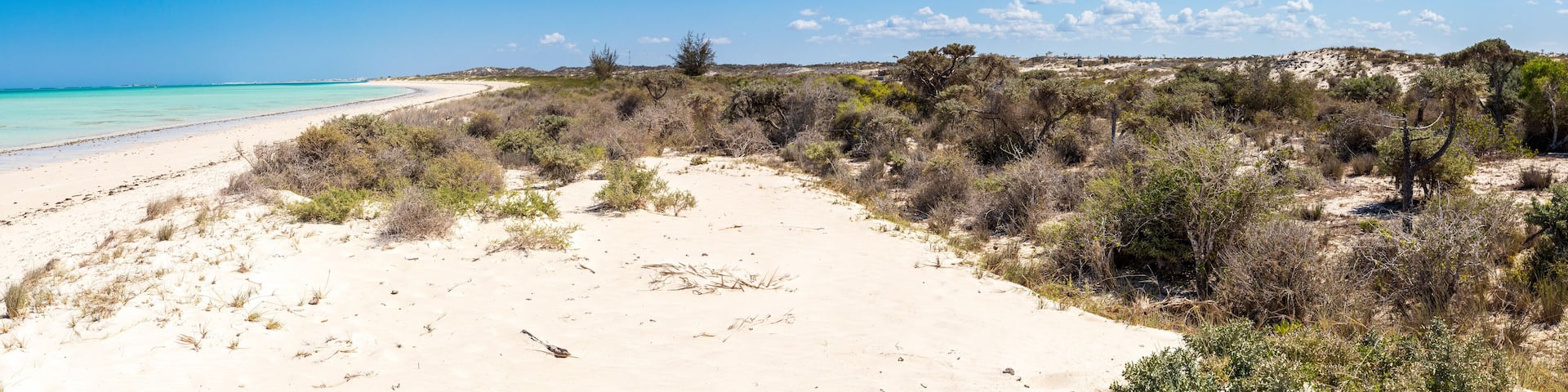 white sand dunes and blue sea in Mamirano bay, Tulear. Madagascar