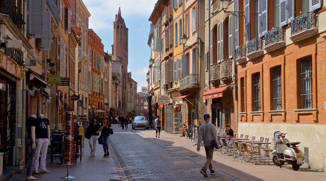 Toulouse which includes street scenes and a city as well as a small group of people