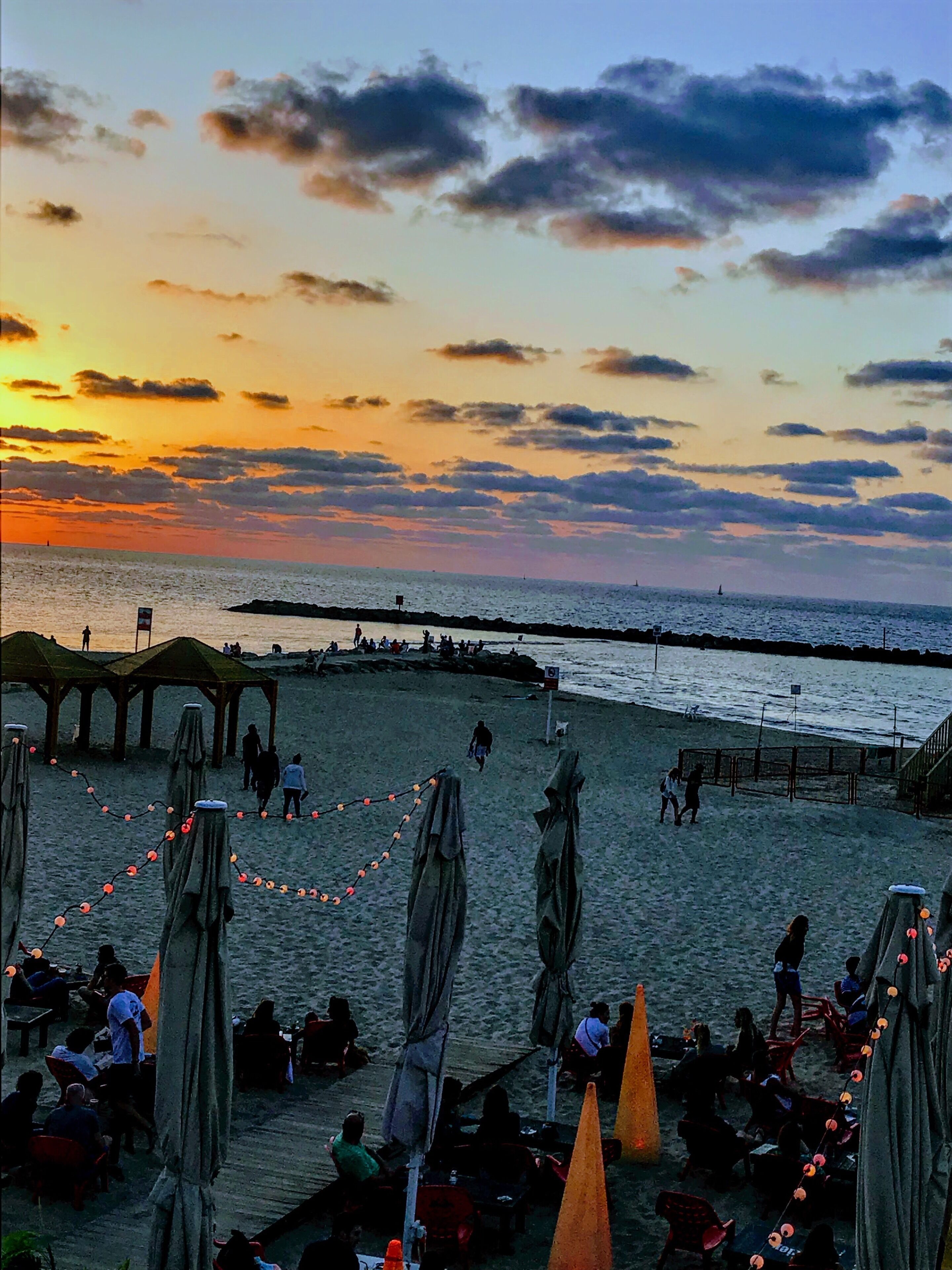 Beautiful sunset captured over a beachfront restaurant #adventure