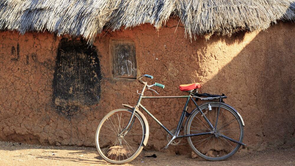 Mud huts and bike