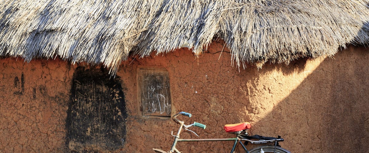 Mud huts and bike