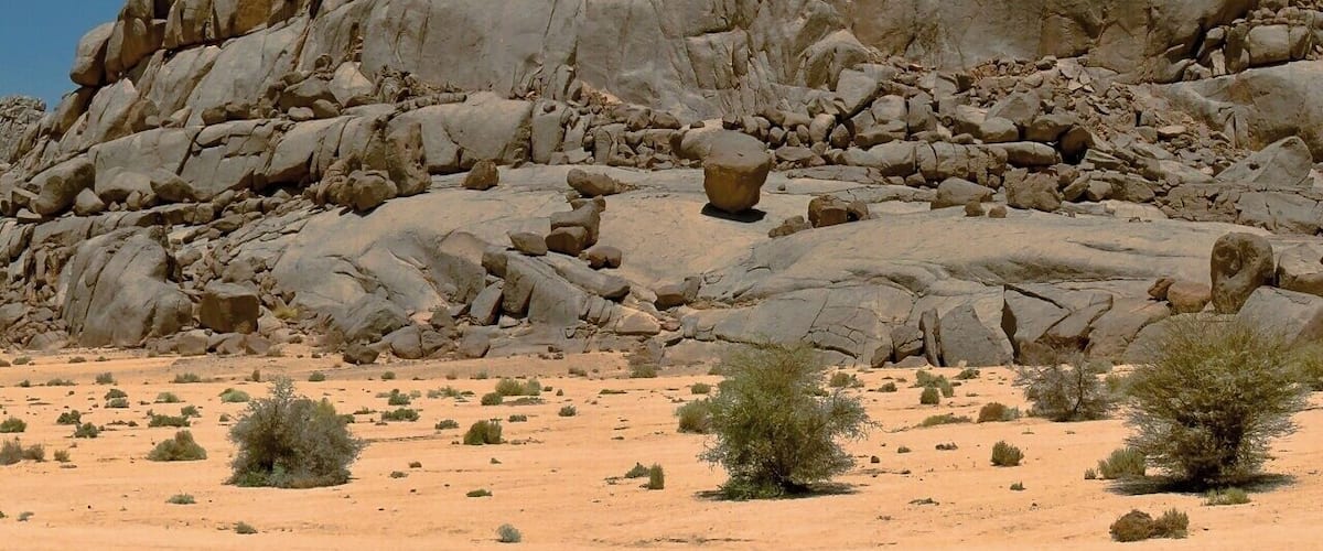 April 2011
Tin Salatin, Ahaggar mountains, Sahara
Tin Salatin rocks along the way from Assekrem and Ilaman towards Tamanrasset in Central Sahara on the outskirts of Ahaggar mountains which are called The Heart of Sahara. It is probably basaltic stone of volcanic origin.