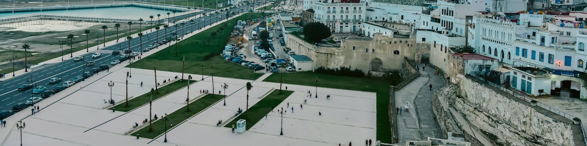 Panoramic cityscape from old fortress with view of port and coastal structure in Tangier. Morocco