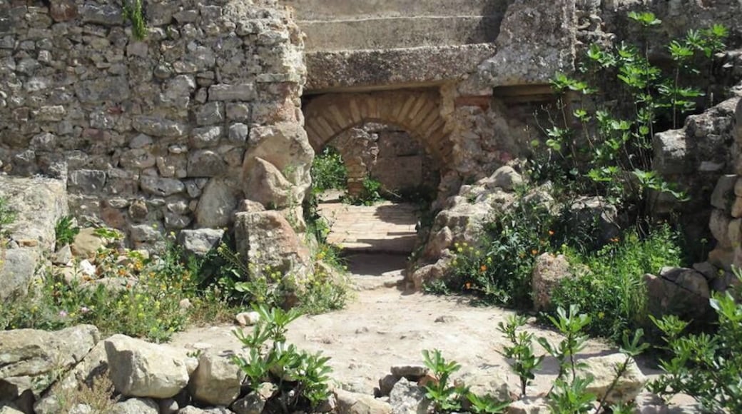 I believe this is the bakery. Water pipes ran underneath the ovens, which heated water for the baths in the surrounding homes.
http://davenotravels.blog