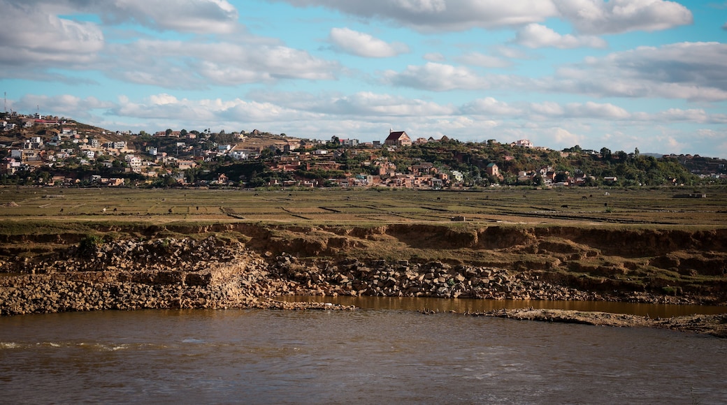 Landscape view of rural fields and hills in the suburb of Antananarivo, Madagascar under a cloudy sky