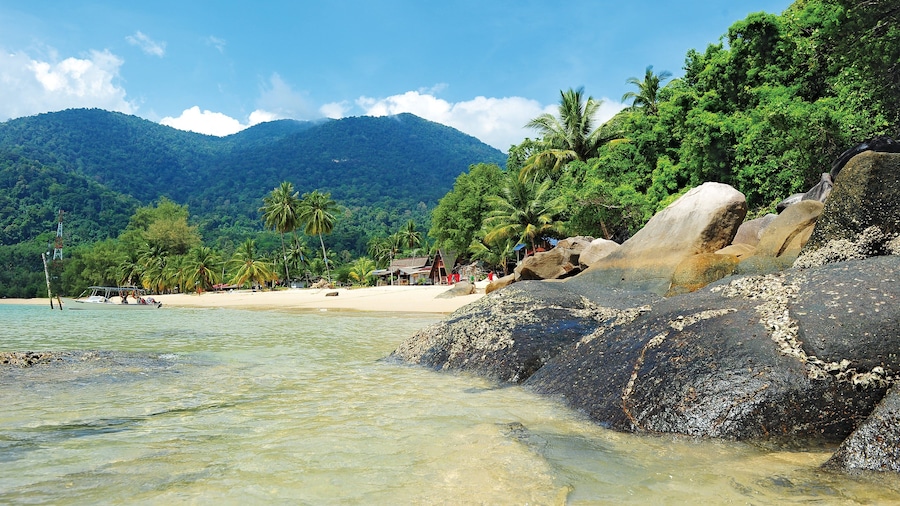 Johor Bahru which includes general coastal views, a sandy beach and tropical scenes
