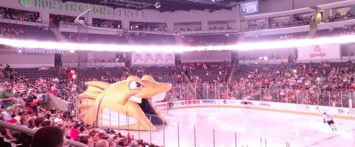 #OurFishOurFight
An enormous inflatable head of Spike, the main mascot for the Toledo Walleye hockey team, serves as a gateway for the players to enter the ice during the announcement of the starting lineups.