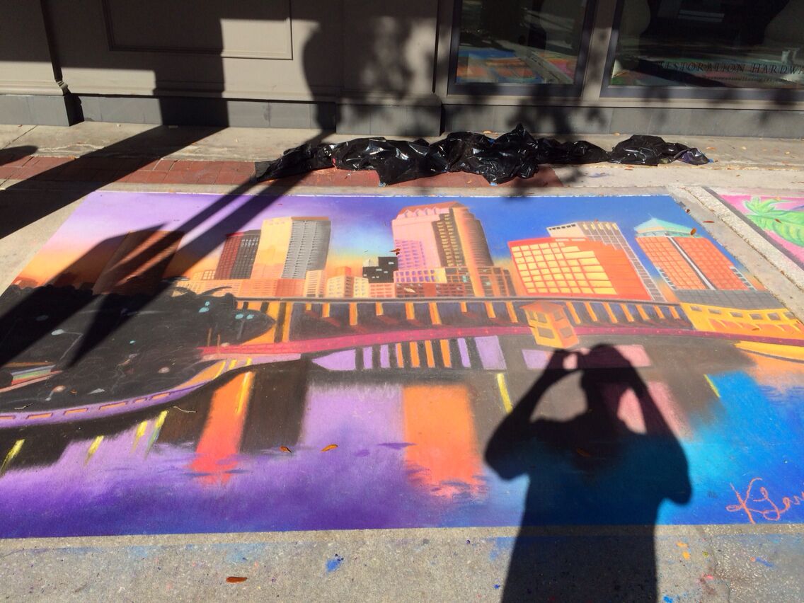 Sidewalk chalkings at Hyde park village.  Amazing how detailed these artists can get with these tools, canvas, and inspirations! Unfortunately, torrential rains next day likely cleansed the artwork.

Tampa Skyline art.